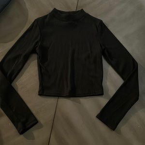 A Black Long Sleeve Mock Shirt